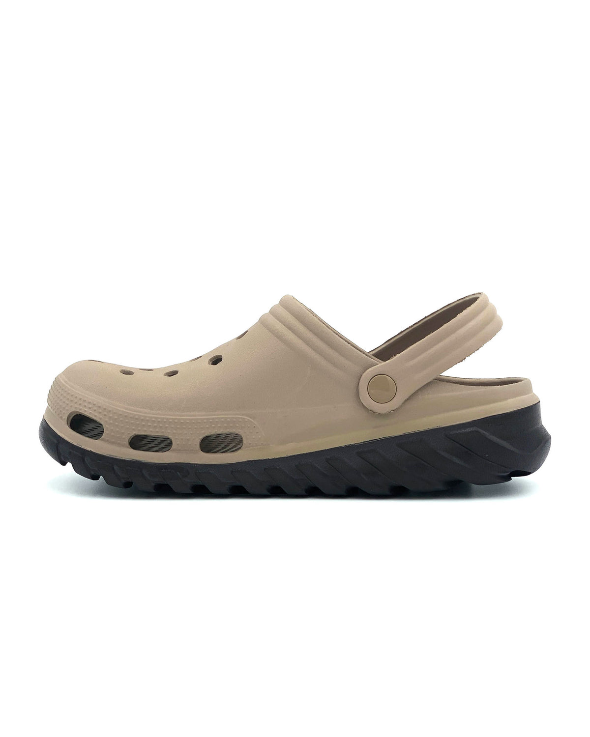 Beige clog shoe with black sole on a white background